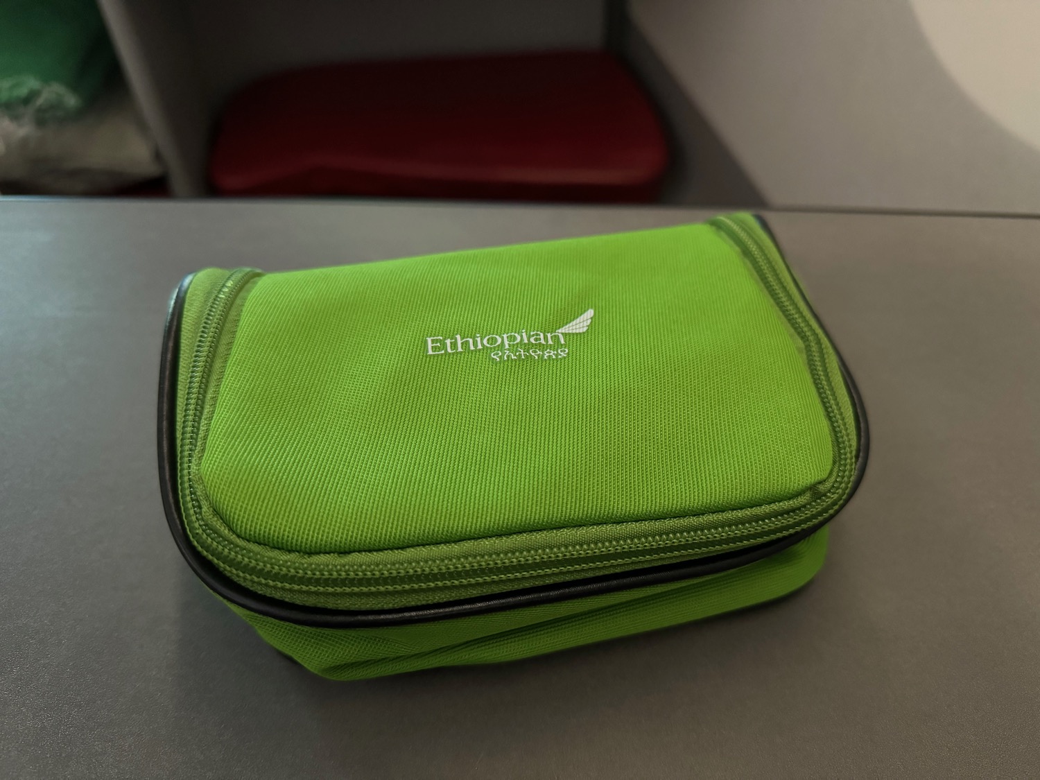 a green bag on a table