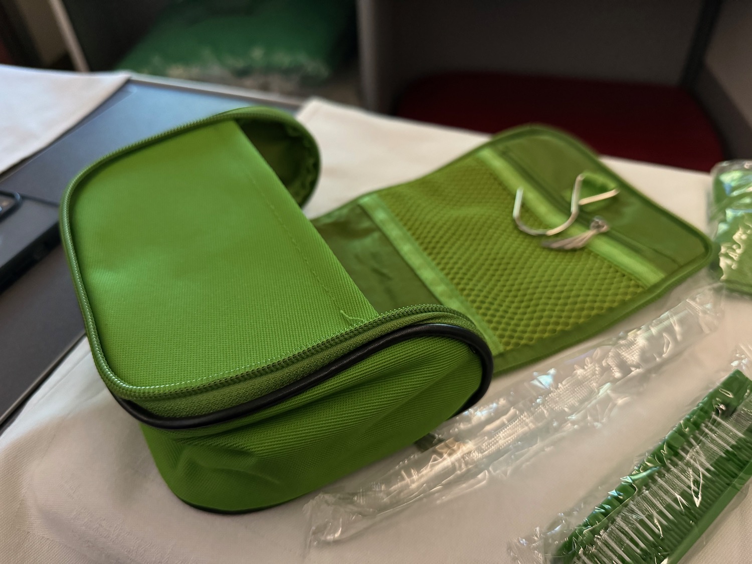 a green bag on a table