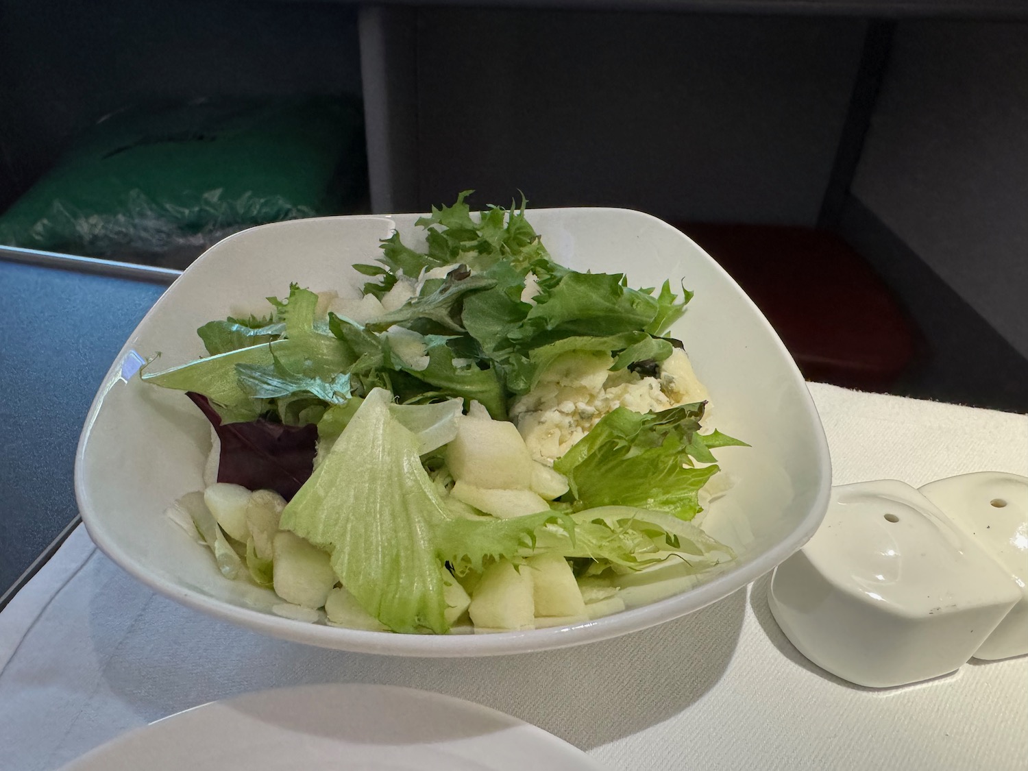 a bowl of salad on a table