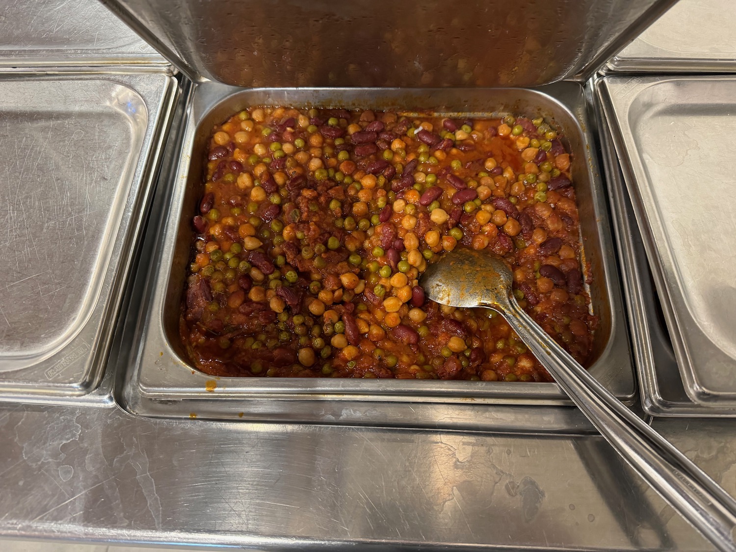 a metal container with food in it