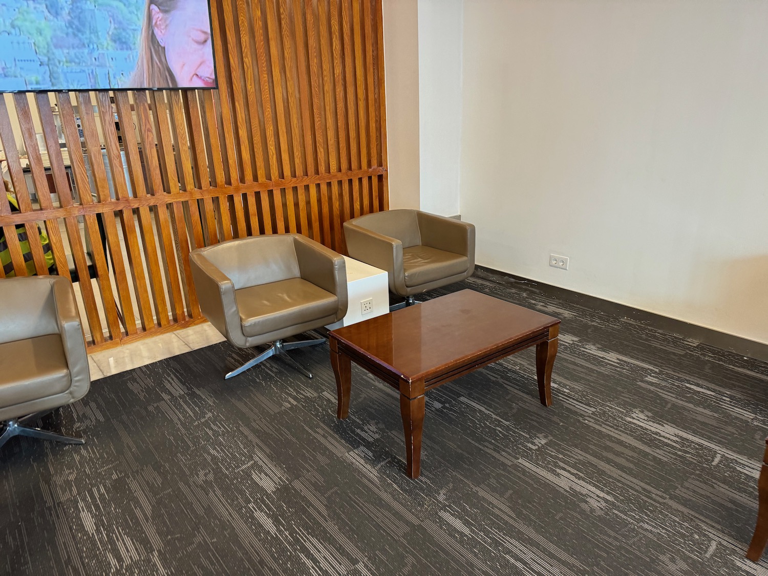 a room with two chairs and a table