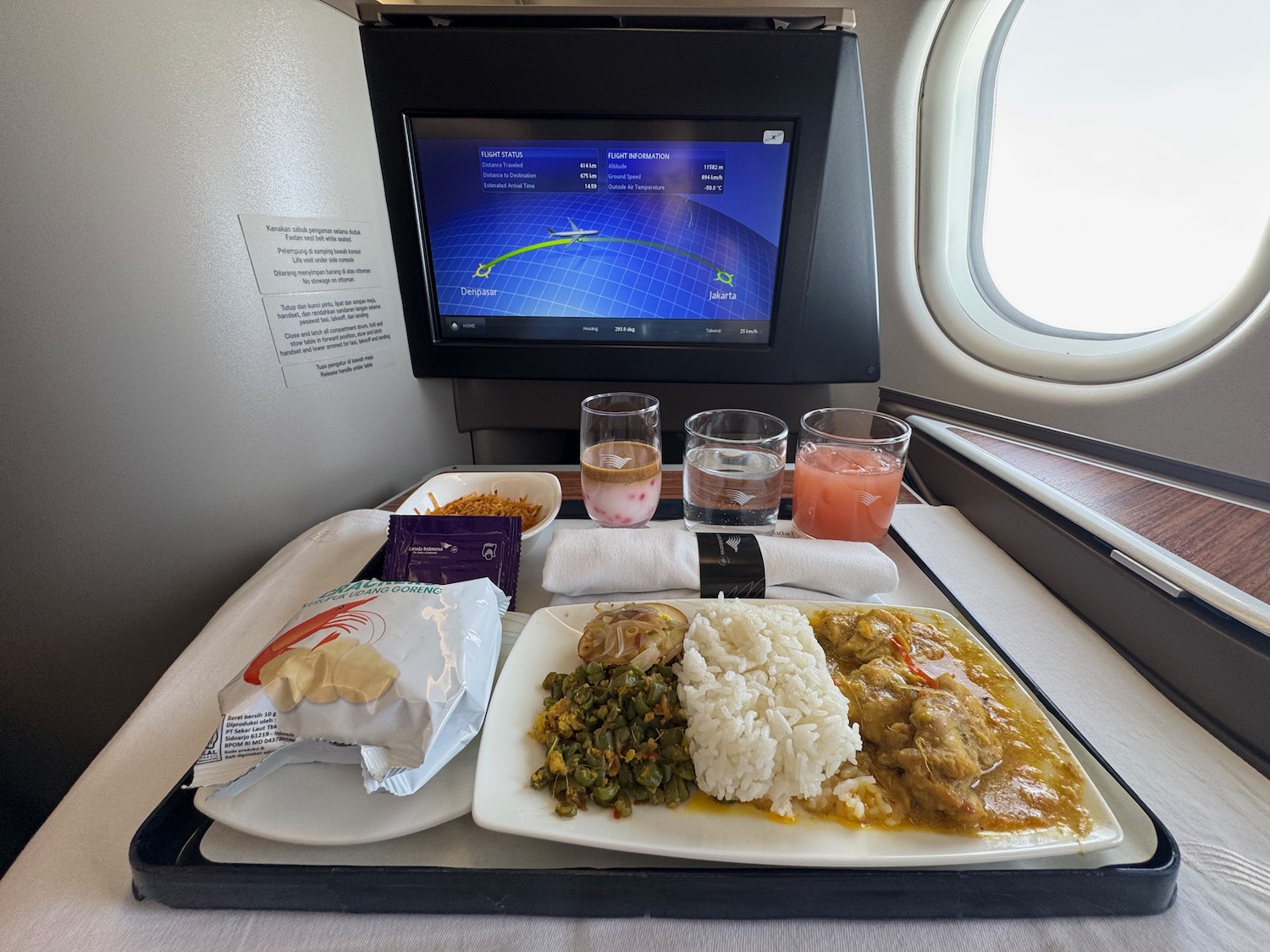 a tray of food on a table with a television