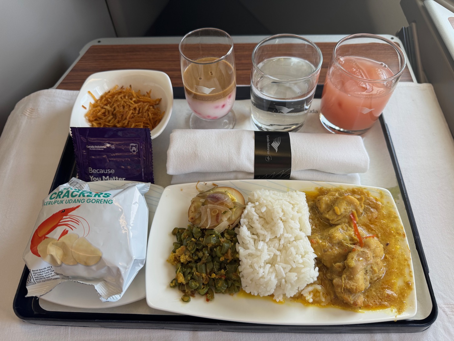 a tray with food and drinks on it