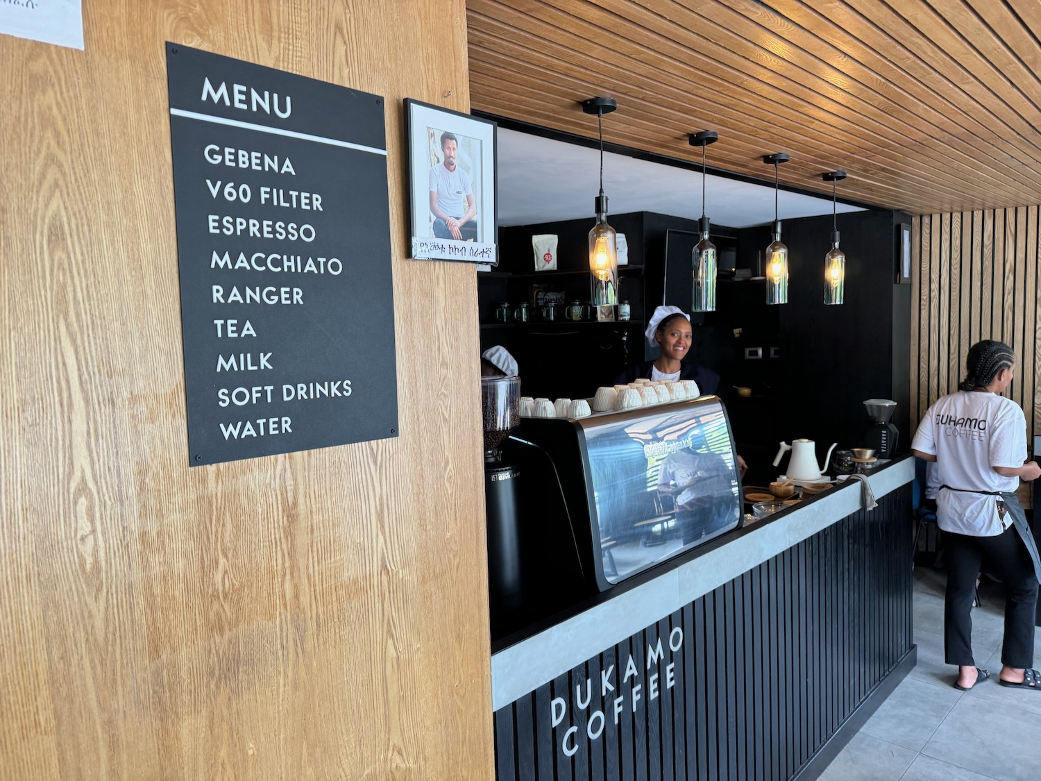 a woman behind a counter