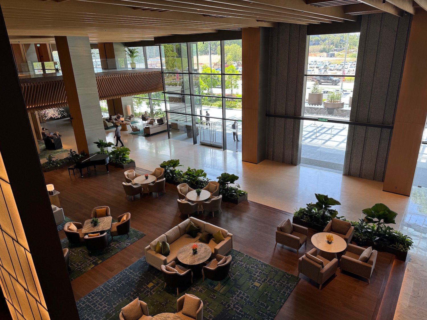 a large lobby with chairs and tables