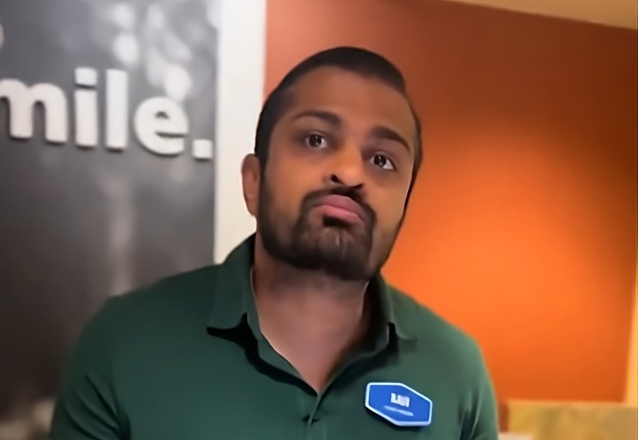 a man in a green shirt