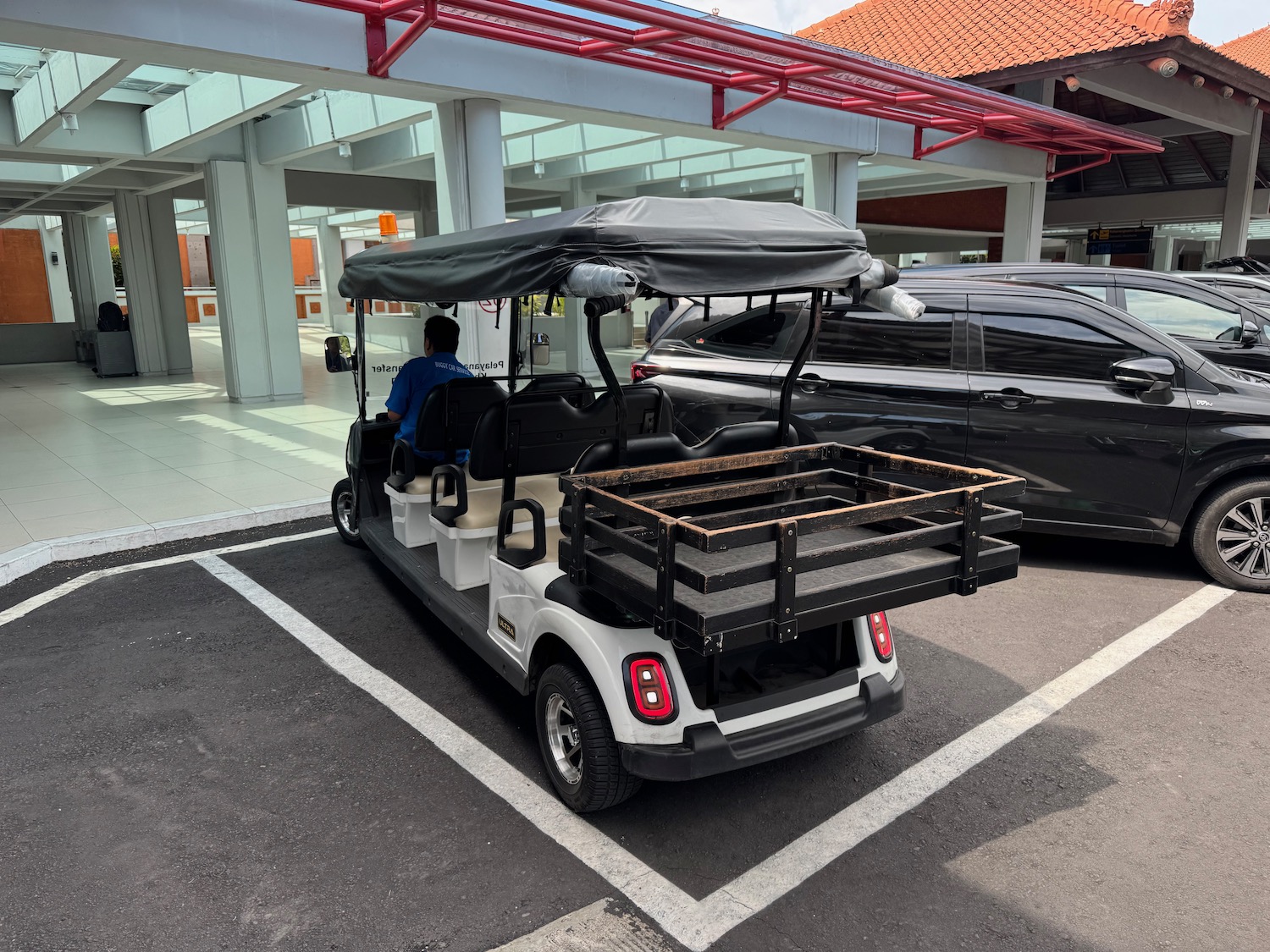 a golf cart parked in a parking lot
