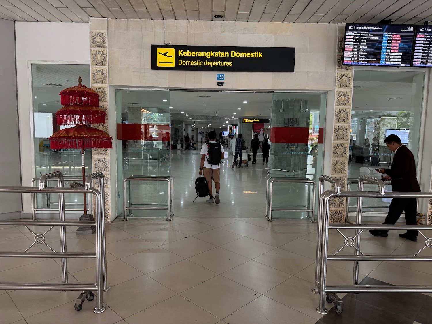 a person with luggage in a building