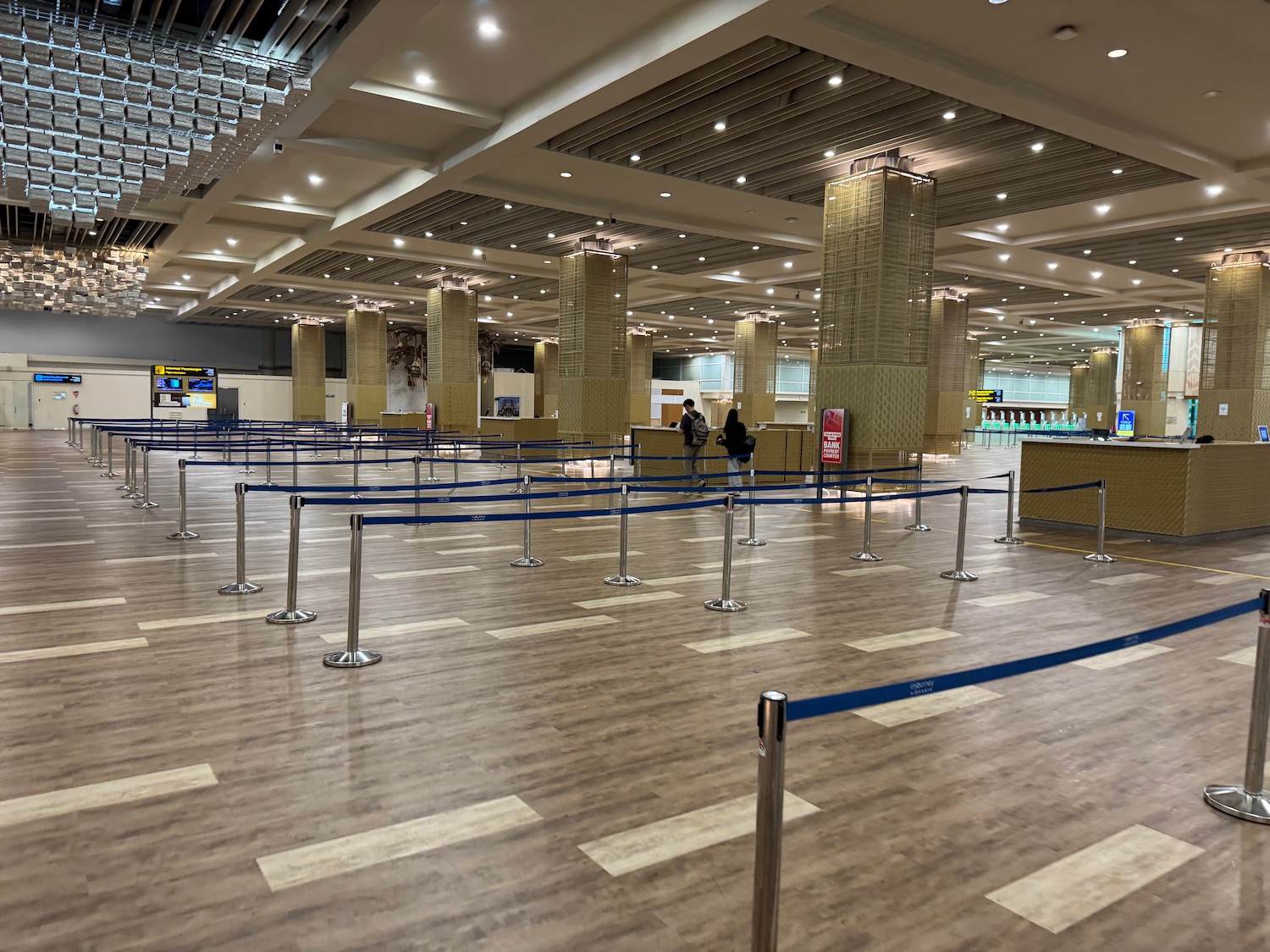 a large airport terminal with a blue line
