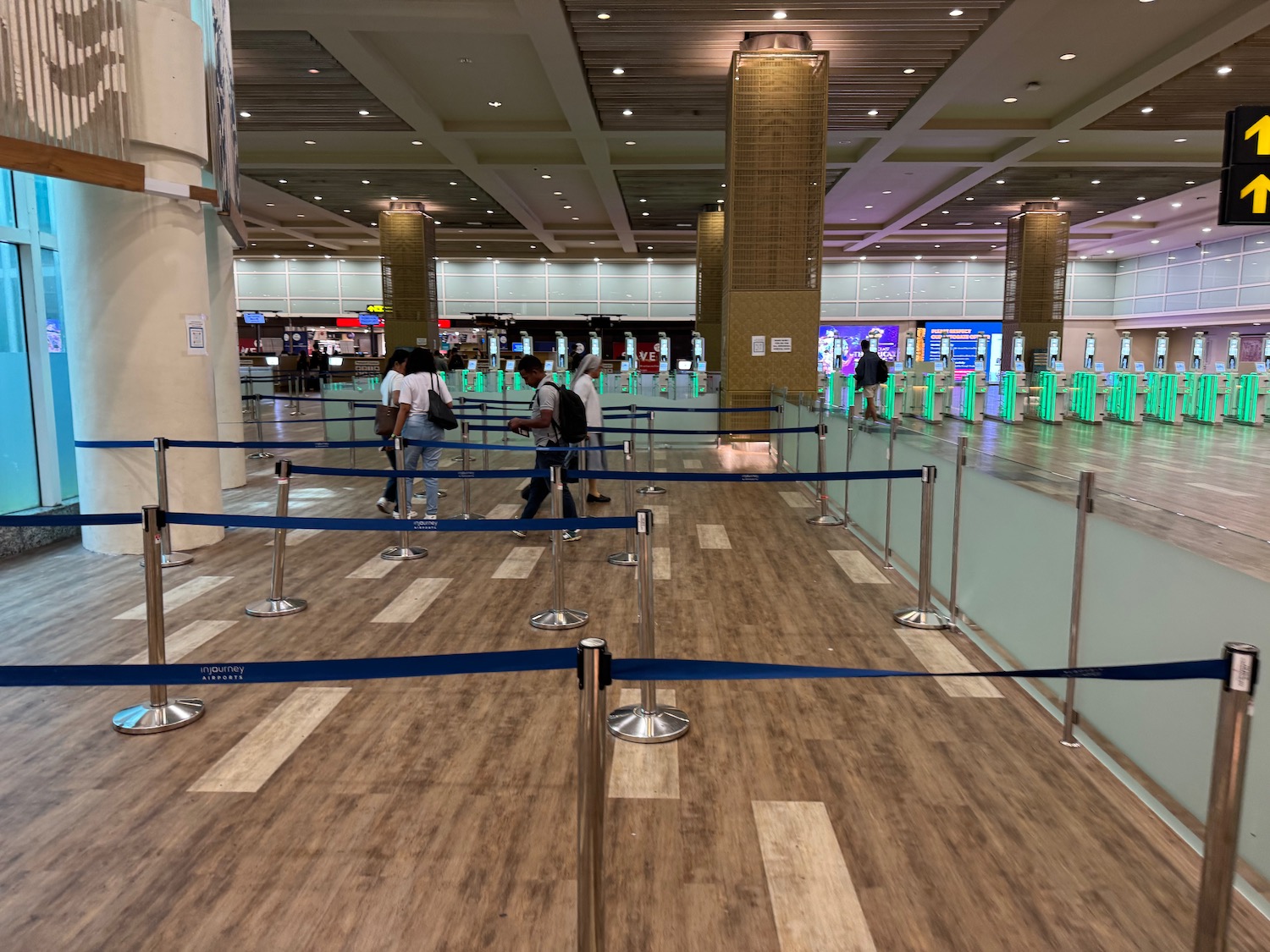 people walking in a large airport