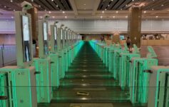 a row of green turnstiles