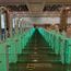 a row of green turnstiles