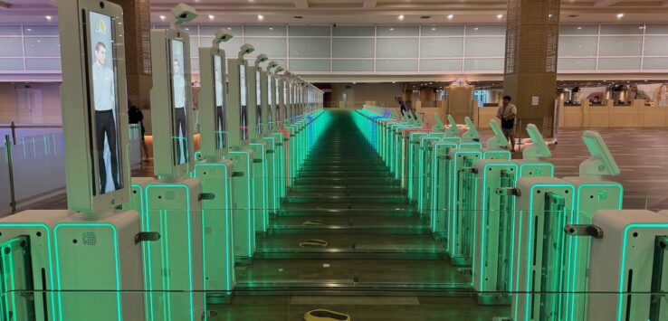 a row of green turnstiles
