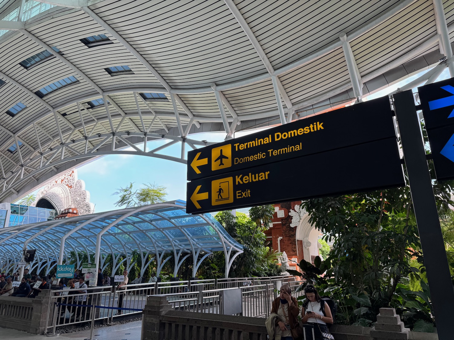 a sign with yellow and black text