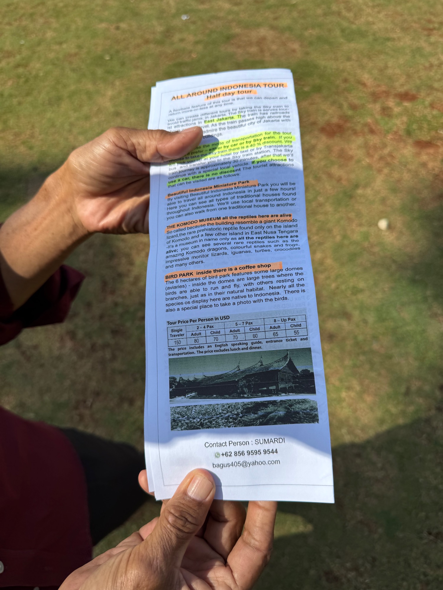 a person holding a piece of paper