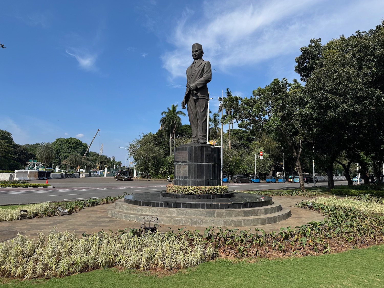 a statue of a man in a park