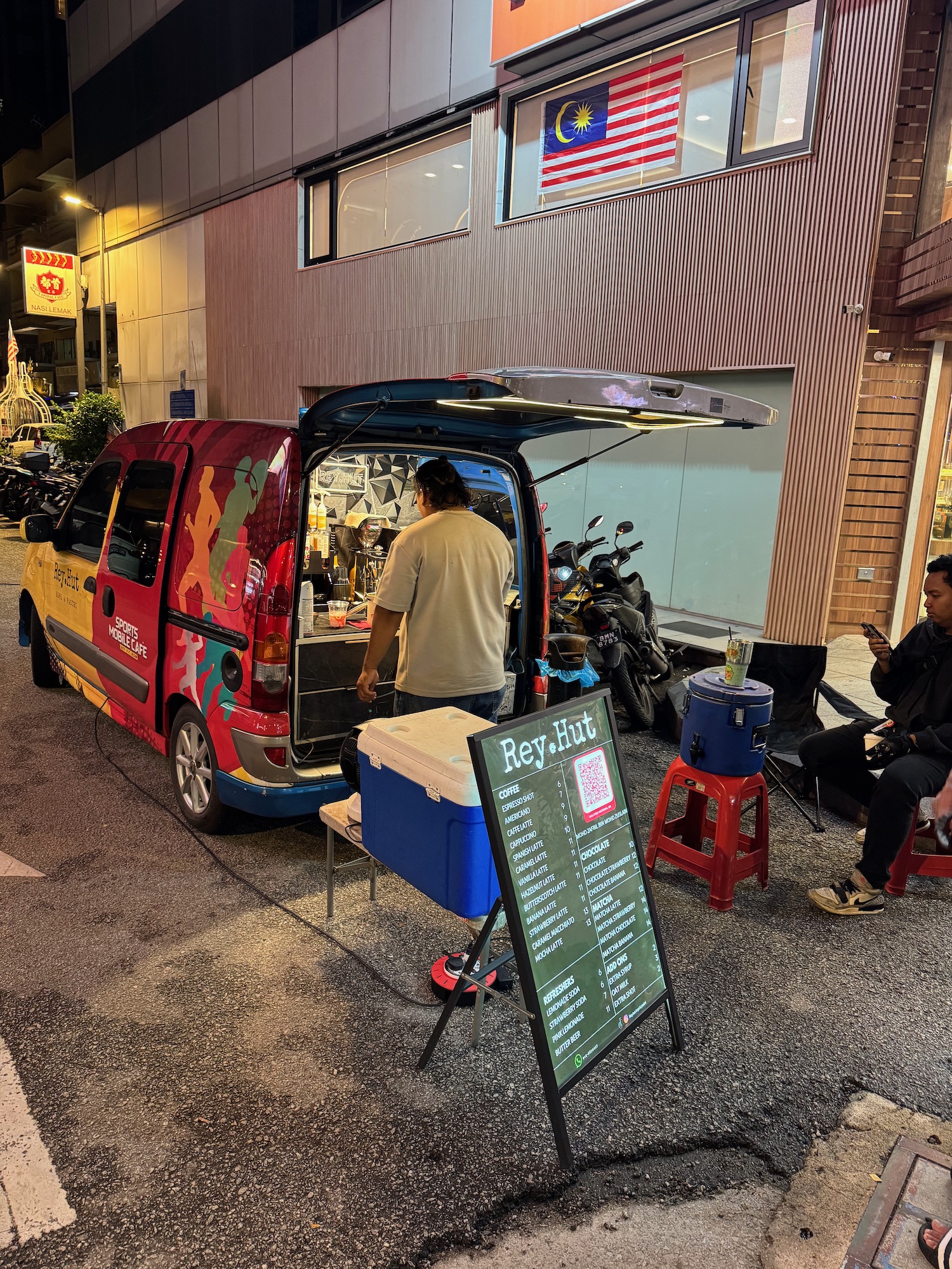 a man standing in front of a van