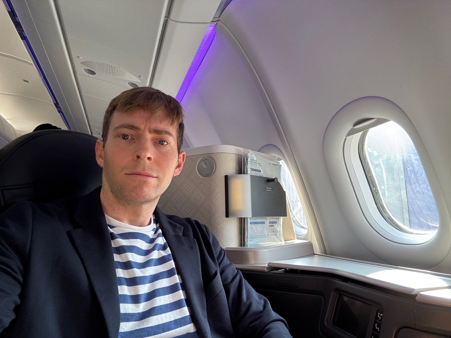 a man sitting in an airplane