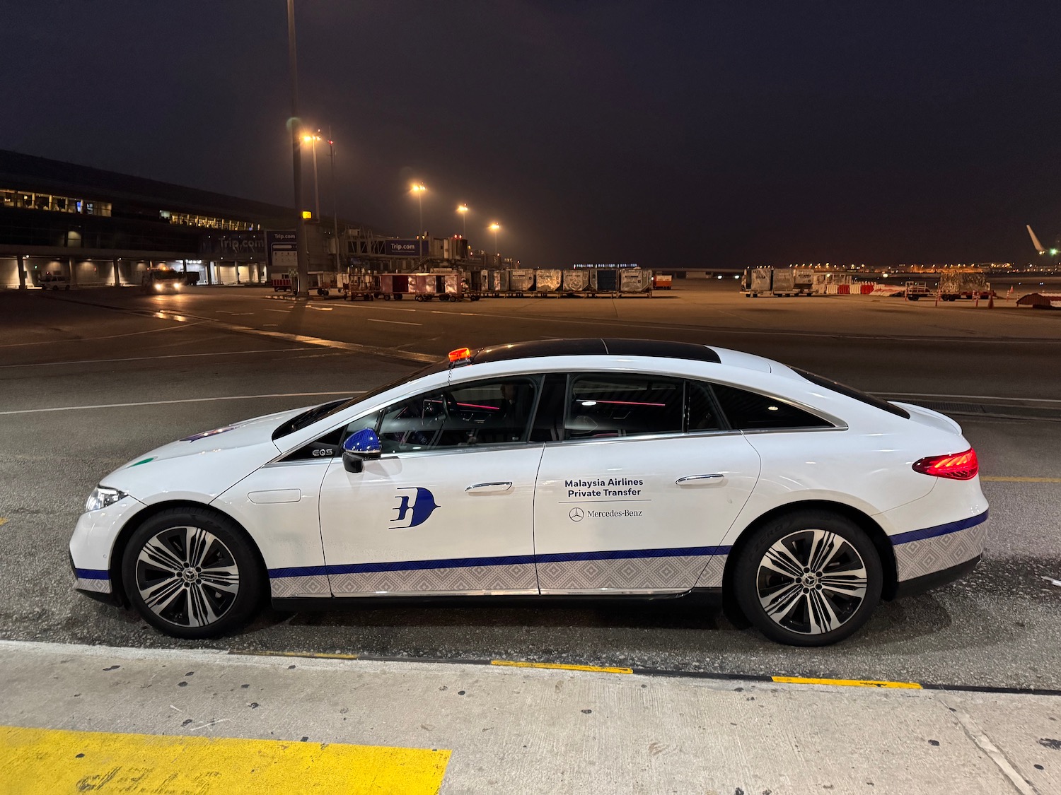 a white car parked on a street