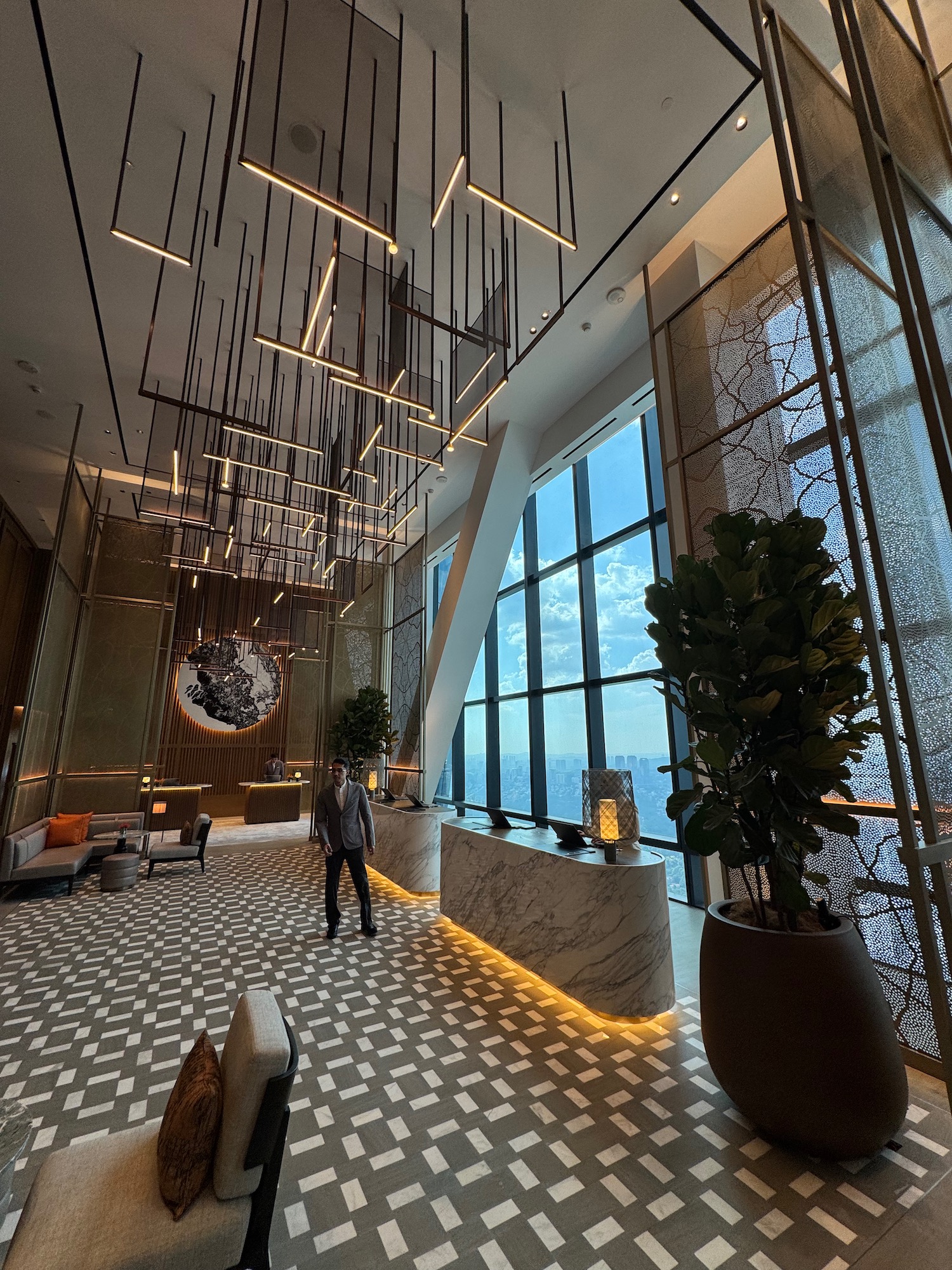 a man standing in a lobby