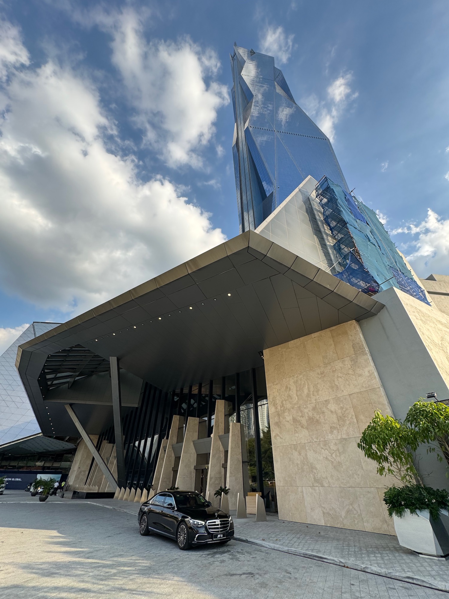 a tall building with a glass tower