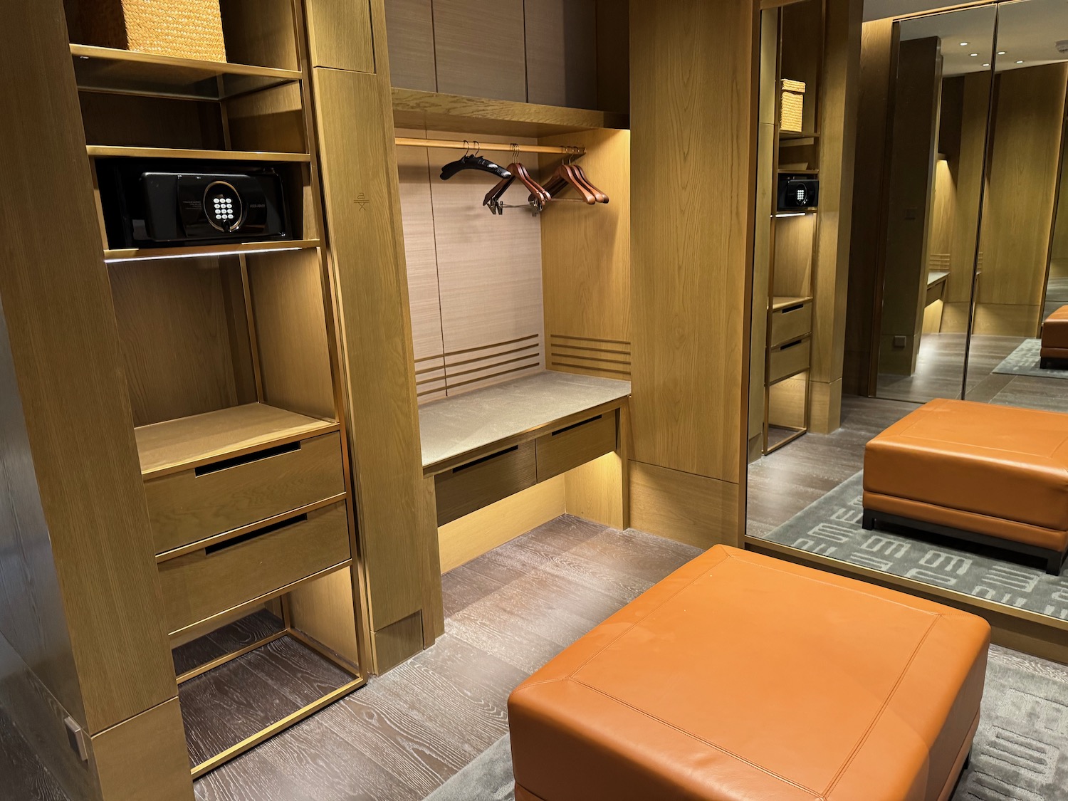 a room with a closet and a bench