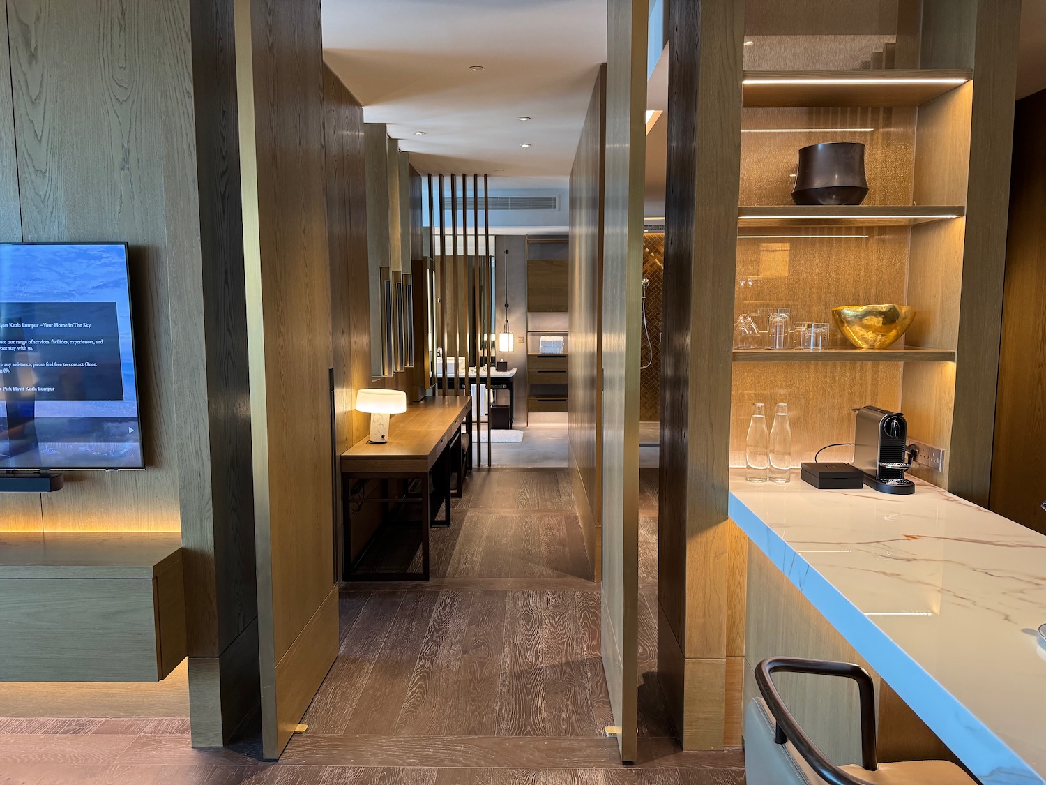 a room with a tv and a table