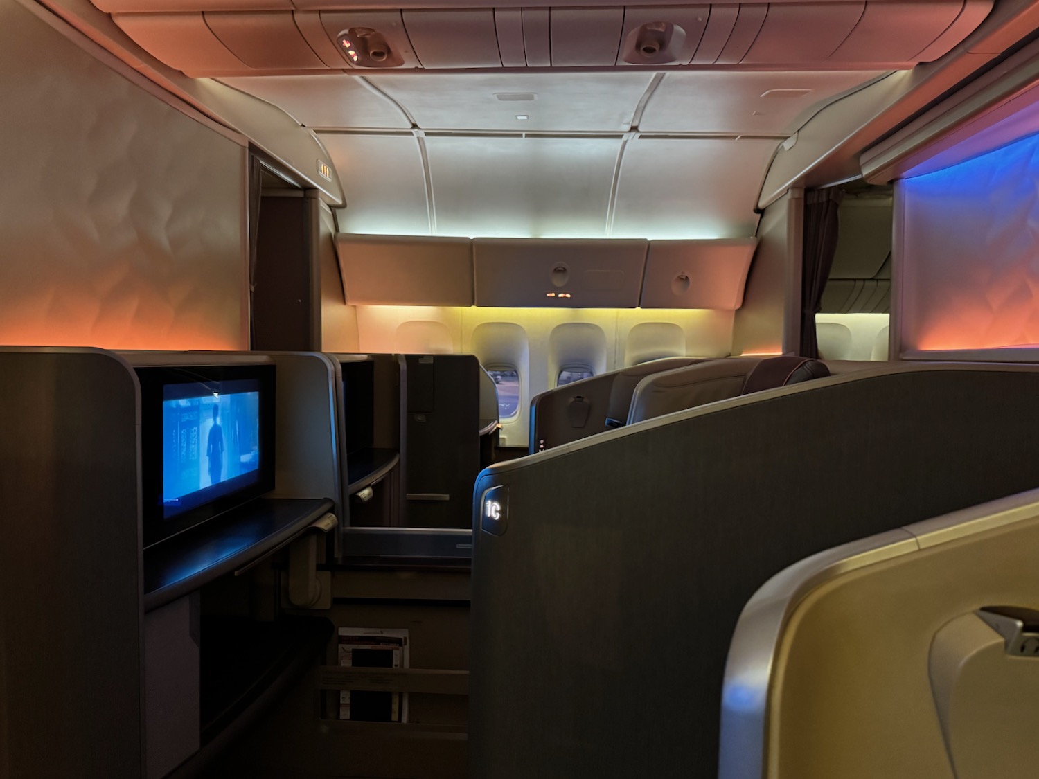 a tv on a table in an airplane