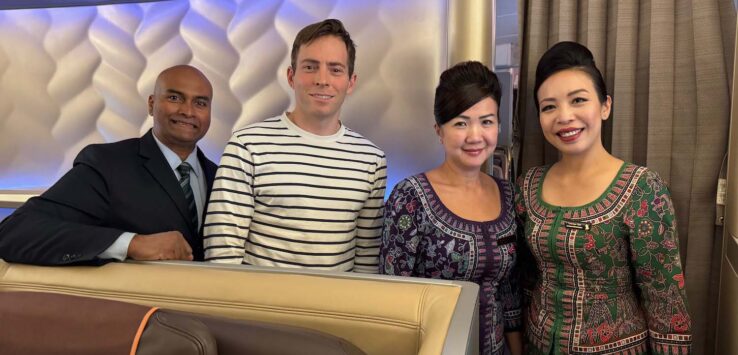 a group of people standing in a room