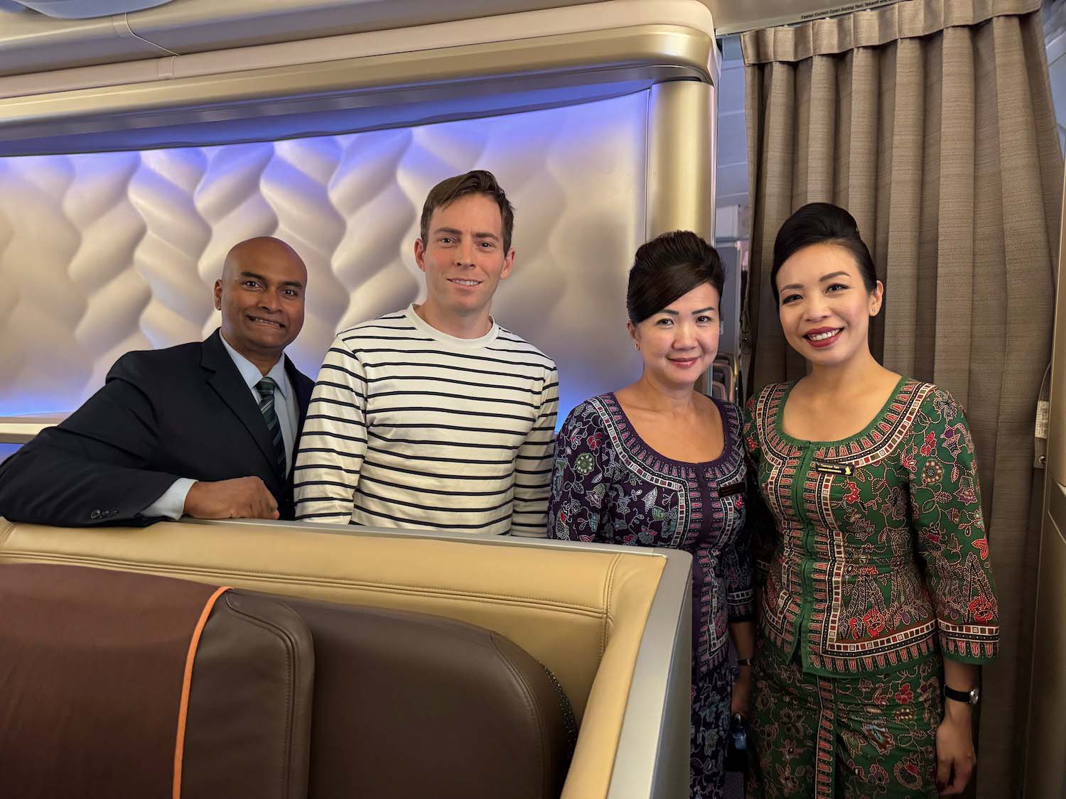 a group of people standing in a room