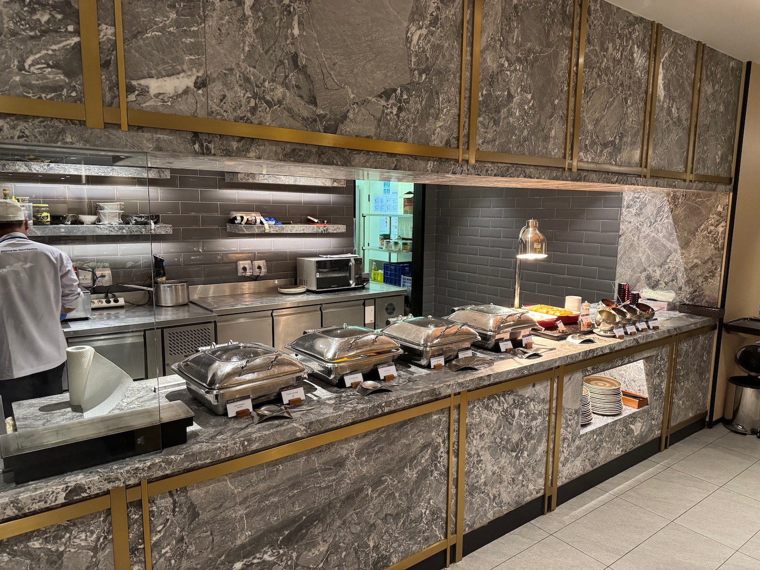 a buffet line with food on it