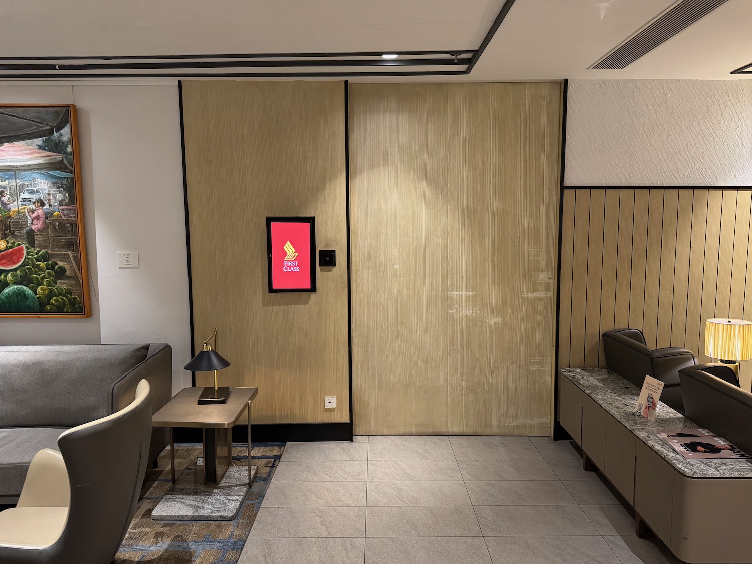 a room with a large door and a couch