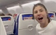 a woman sitting in an airplane