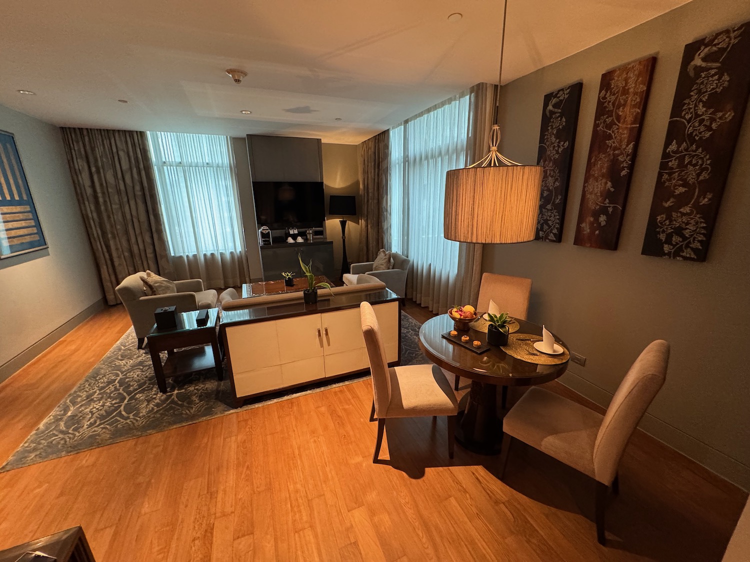 a room with a table and chairs