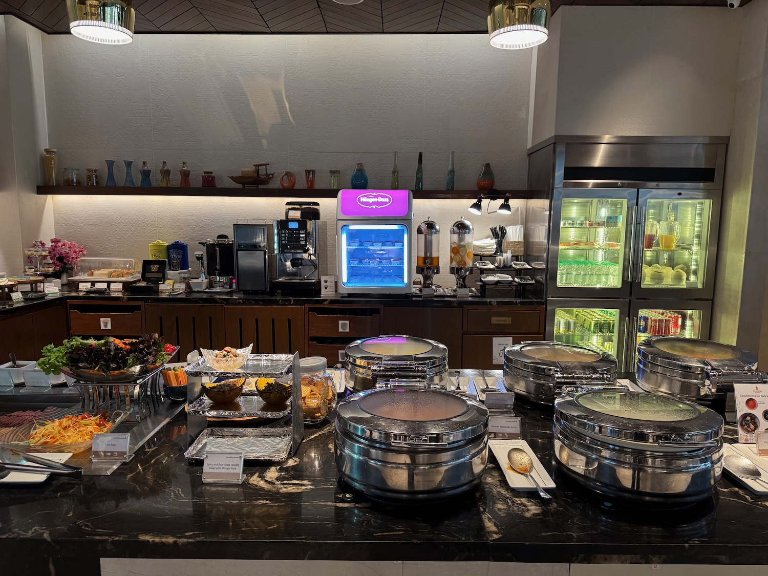 a buffet table with food on it