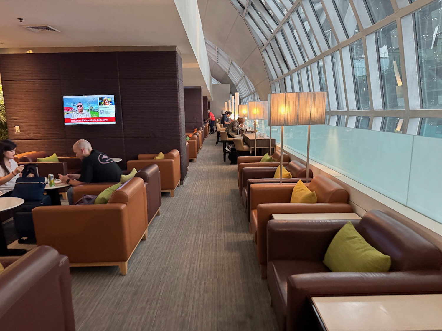 a room with many chairs and tables