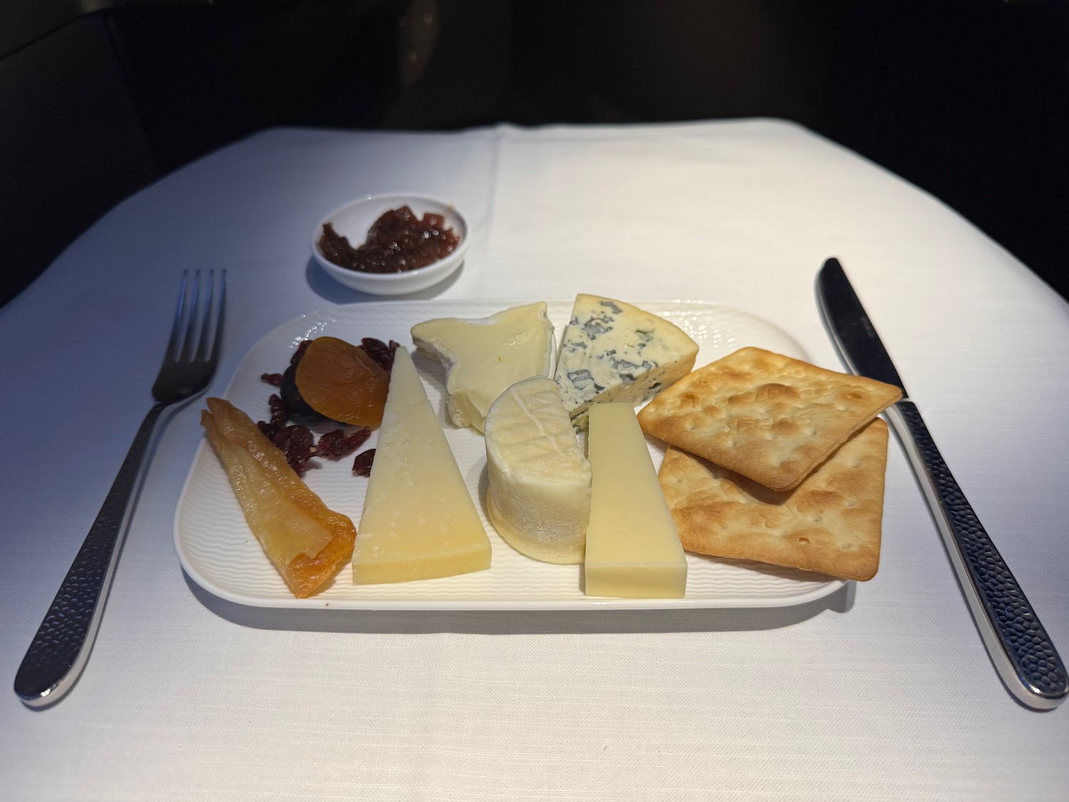 a plate of cheese and crackers