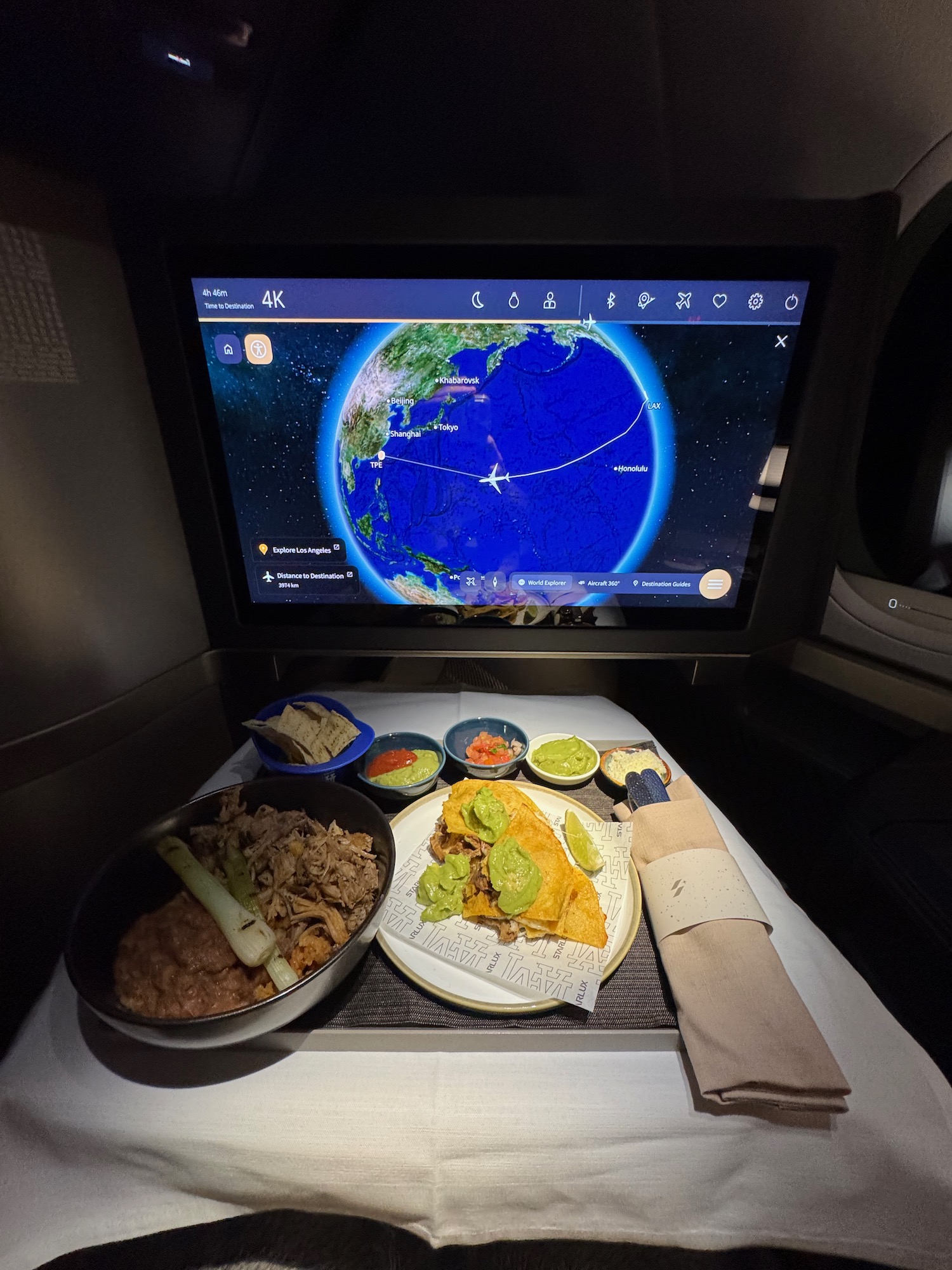 a screen on a tv in an airplane