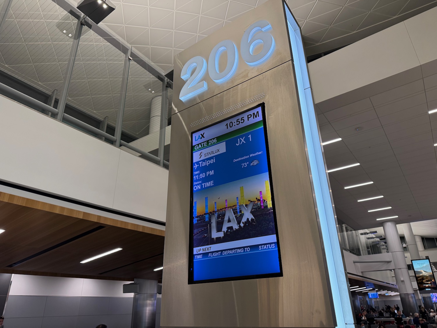 a sign with a screen and numbers