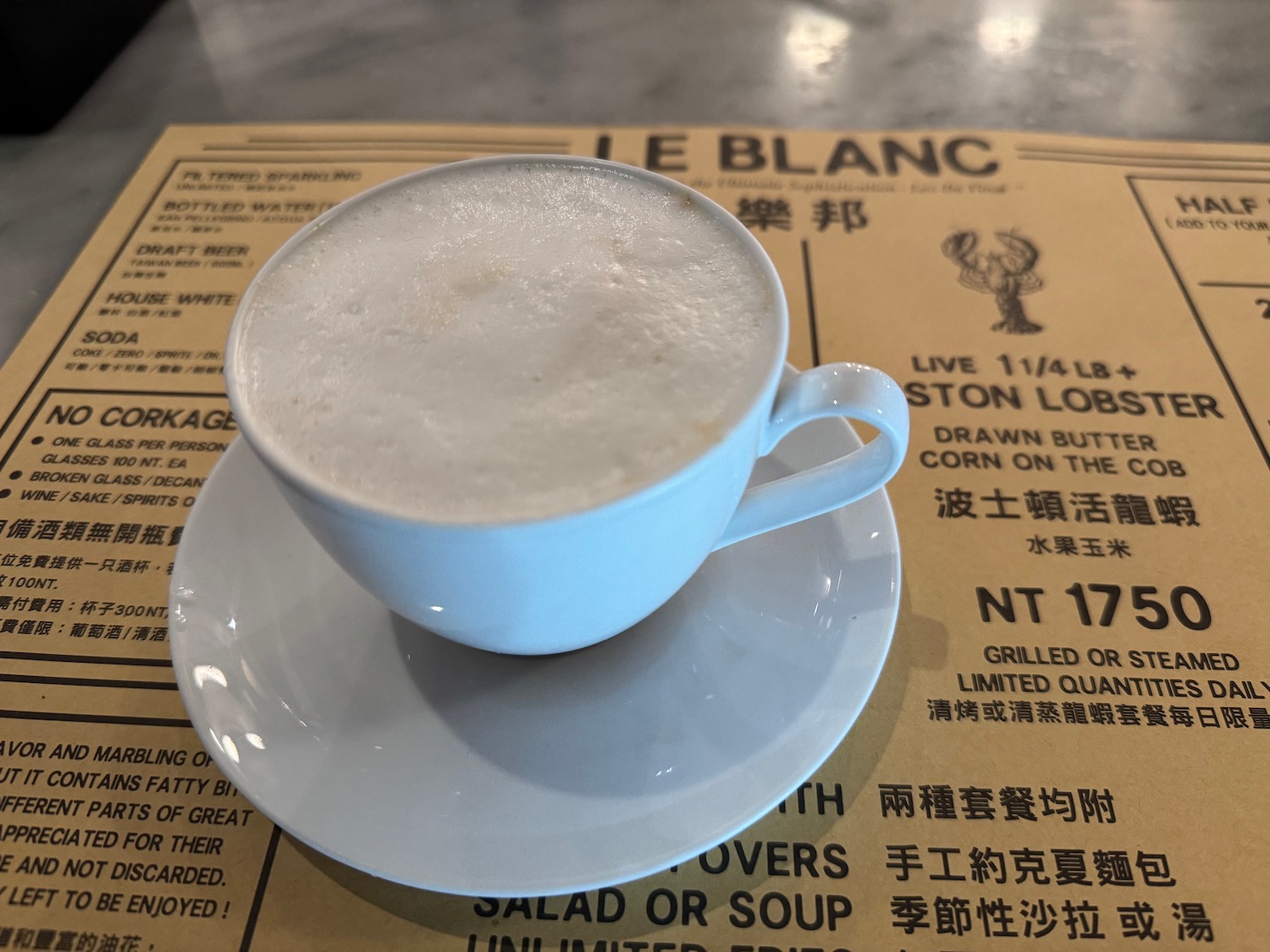 a cup of coffee on a plate