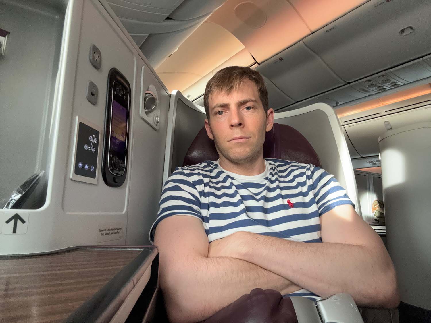 a man sitting in an airplane