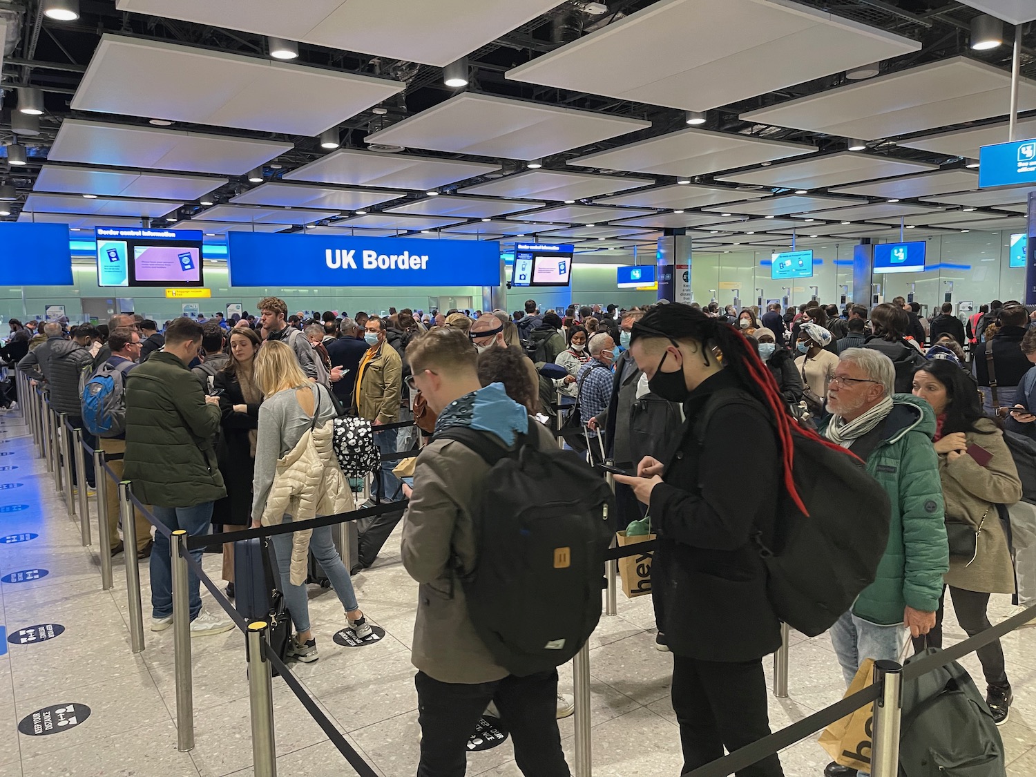 a group of people in a terminal