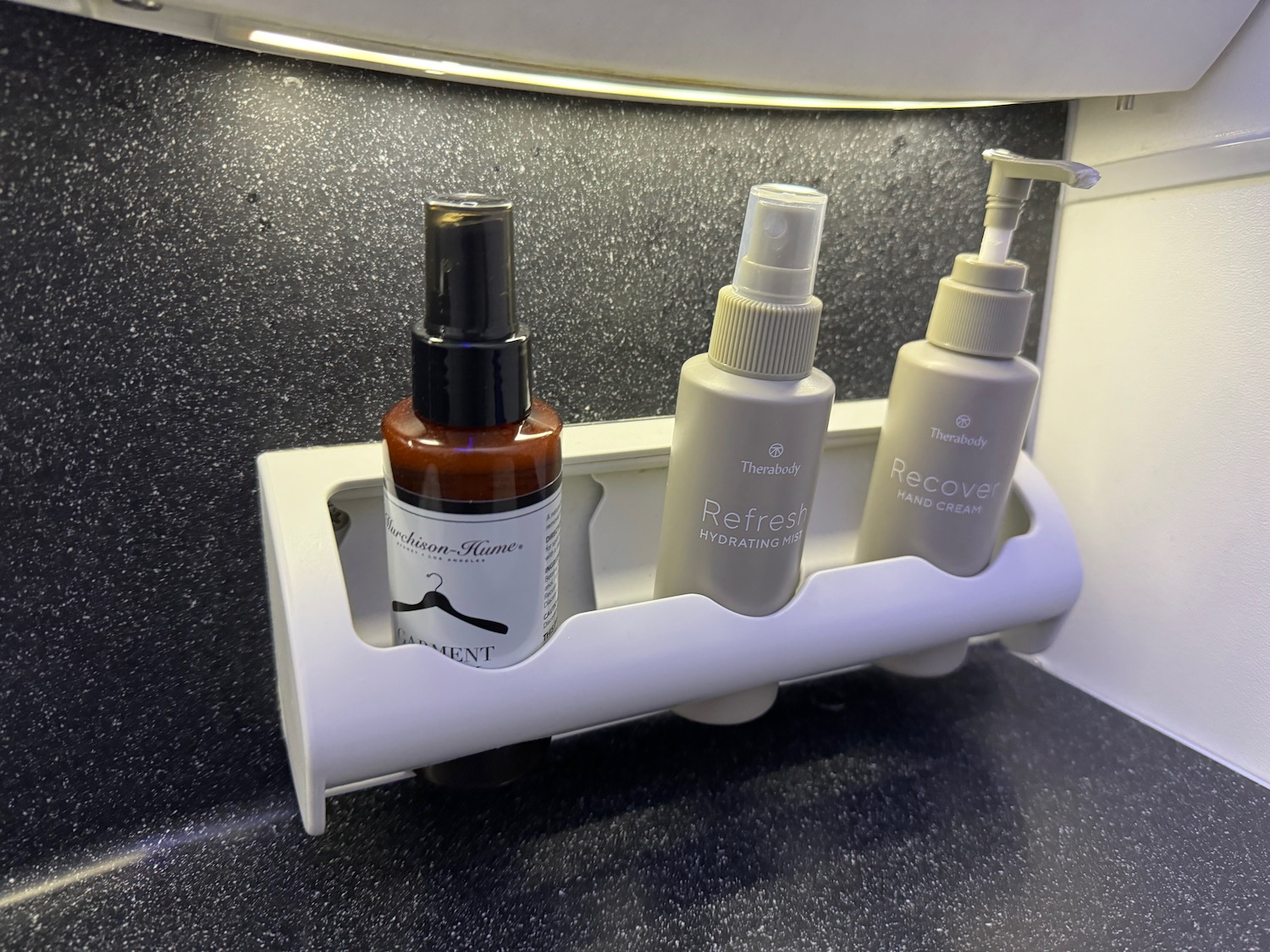 a group of bottles on a shelf