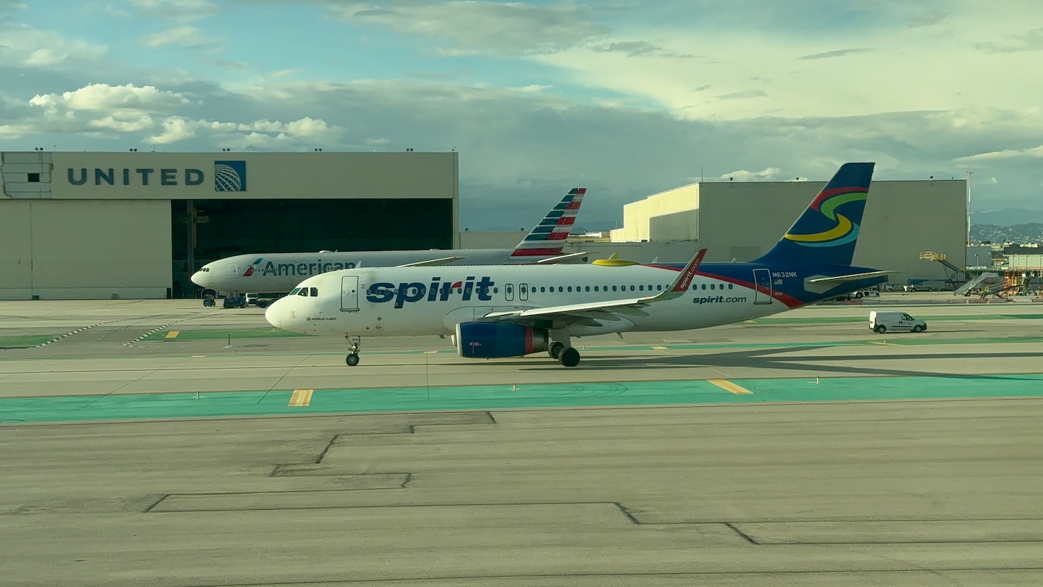 a two airplanes on a runway