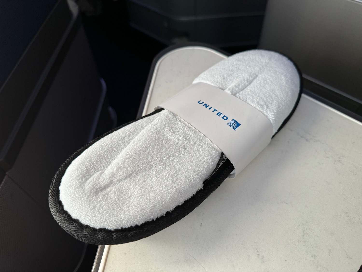 a white slipper on a table