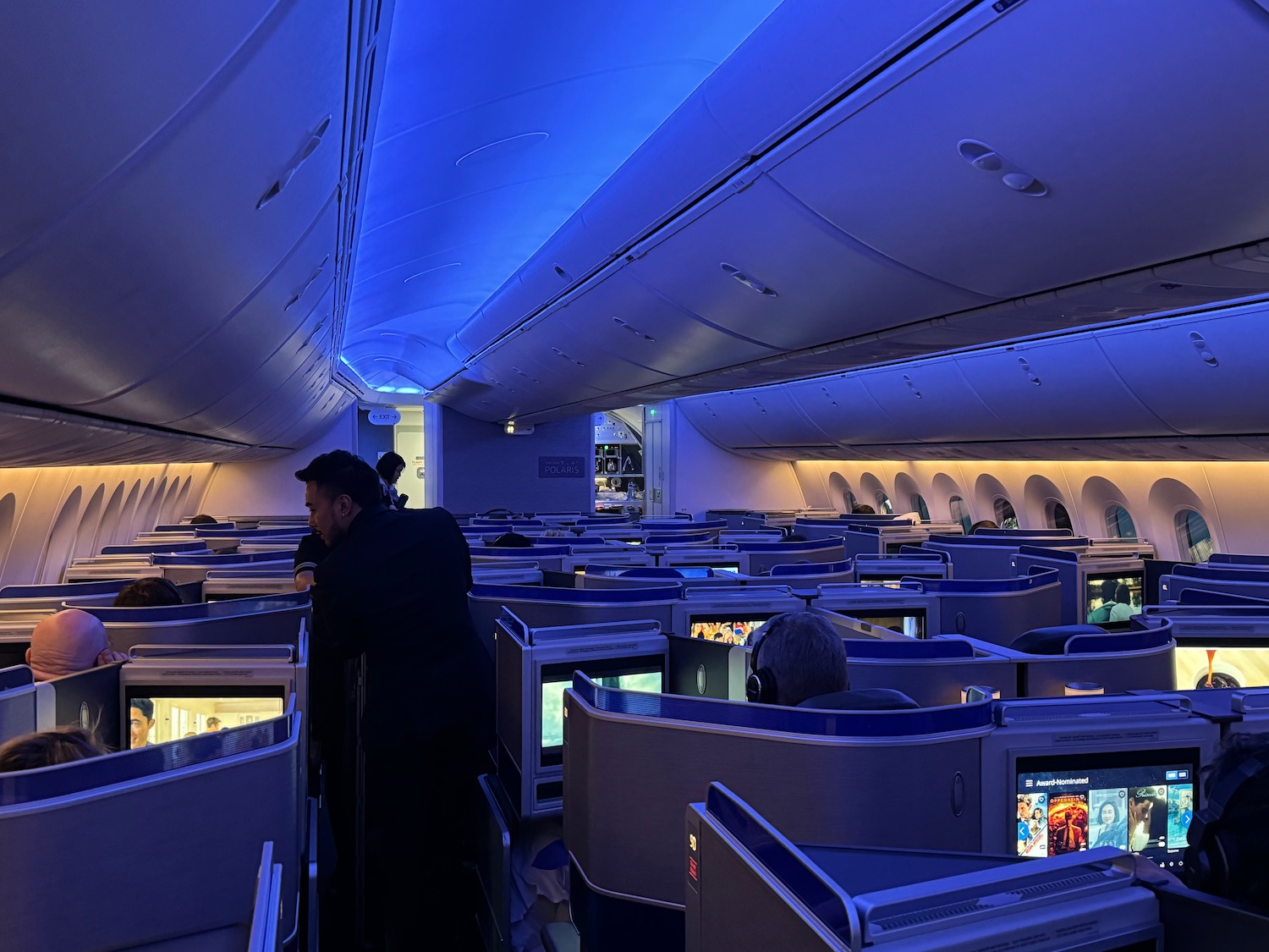 a group of people in an airplane