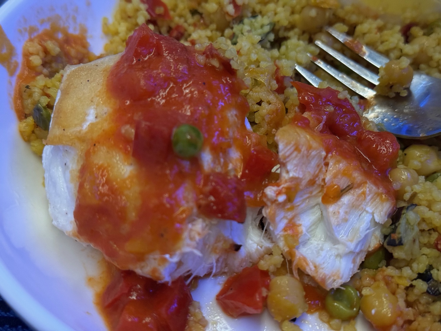 a plate of food with a fork