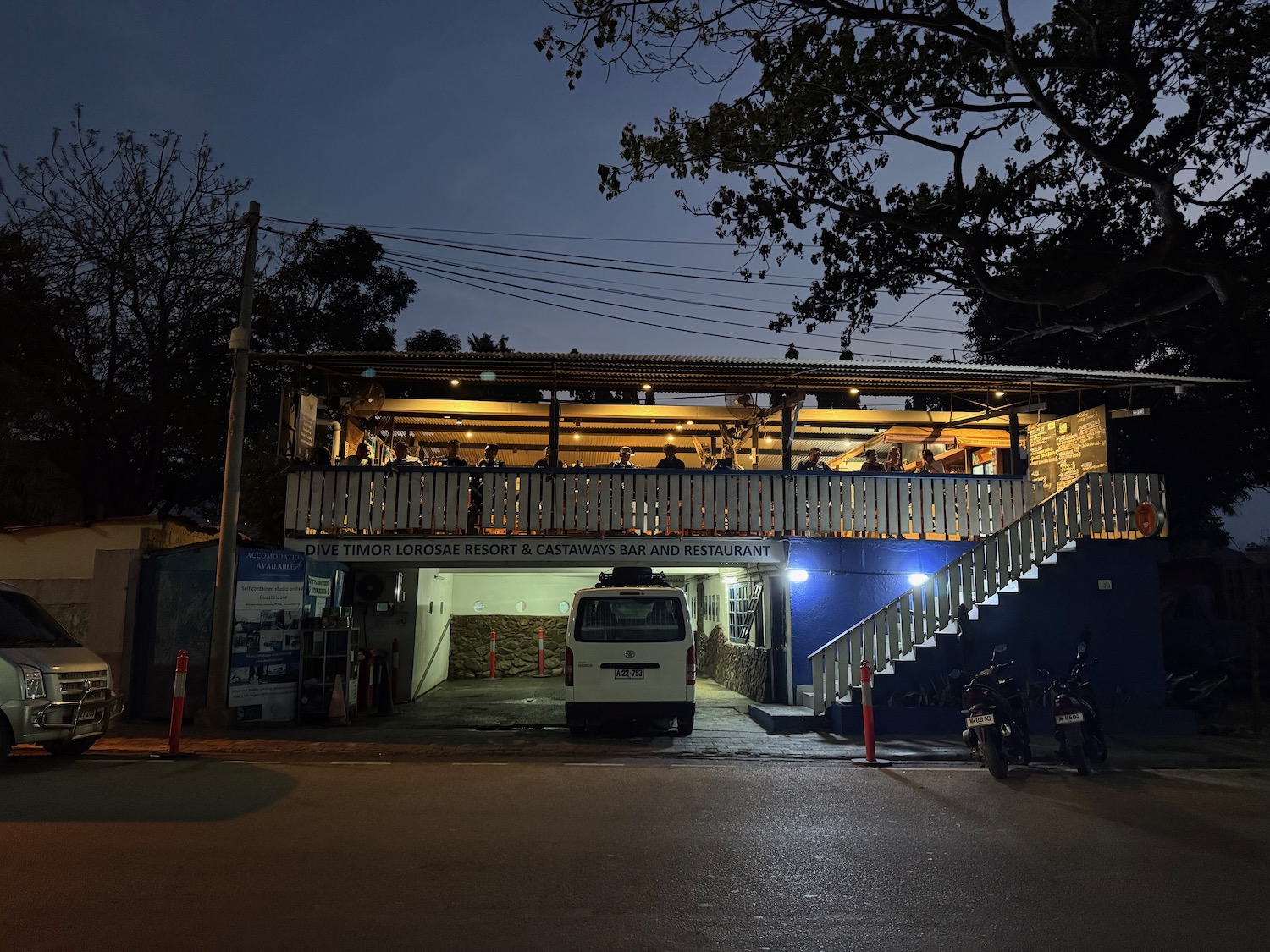 a building with a white van parked in front of it