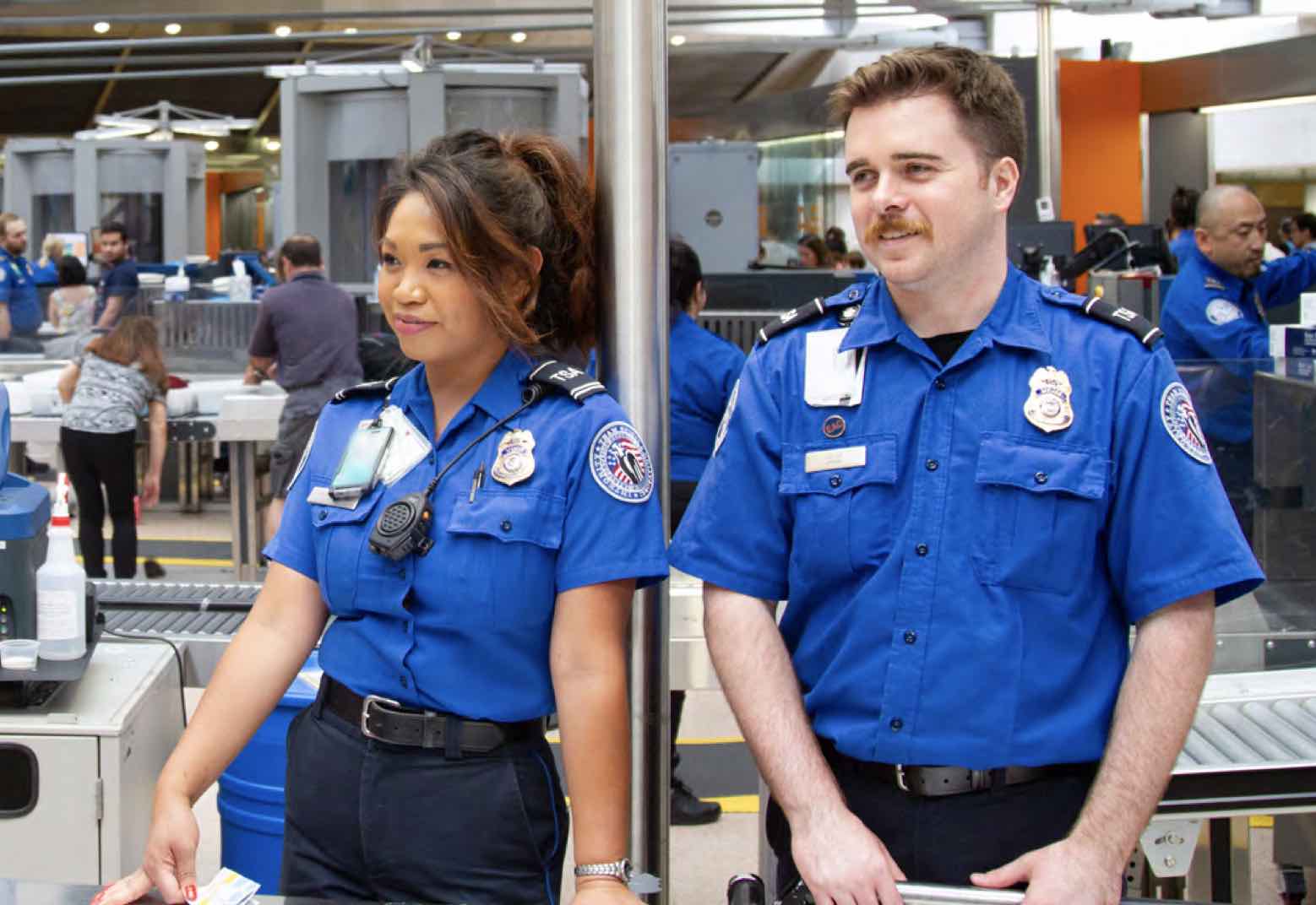 a man and woman in uniform