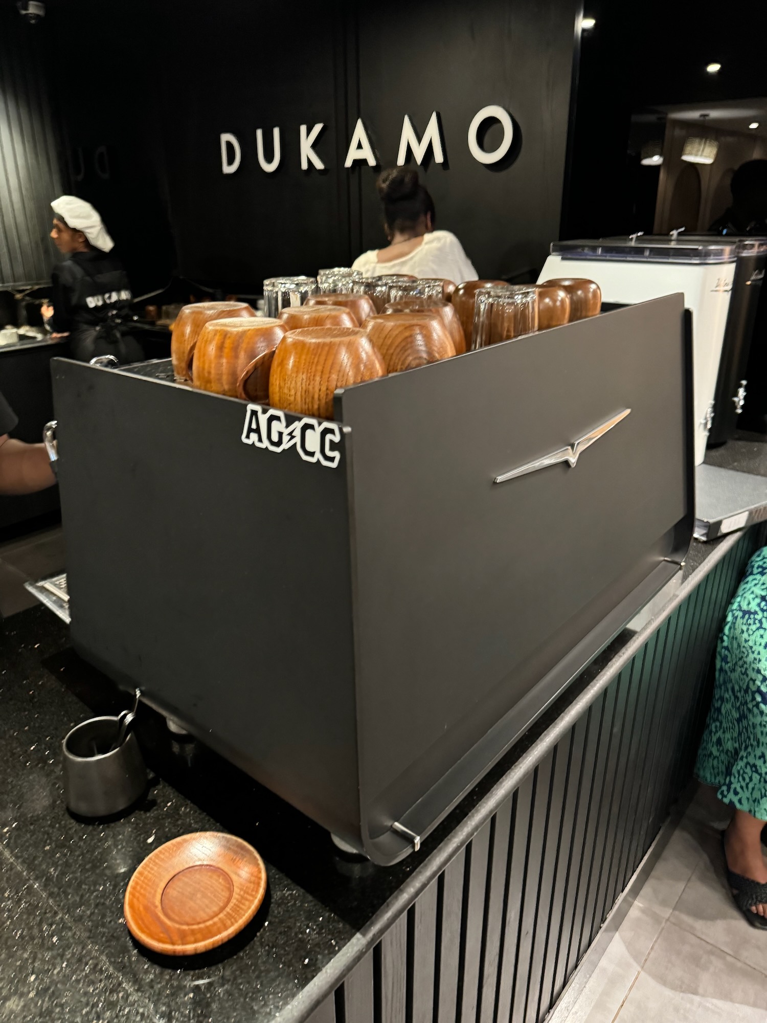 a large container with glasses inside